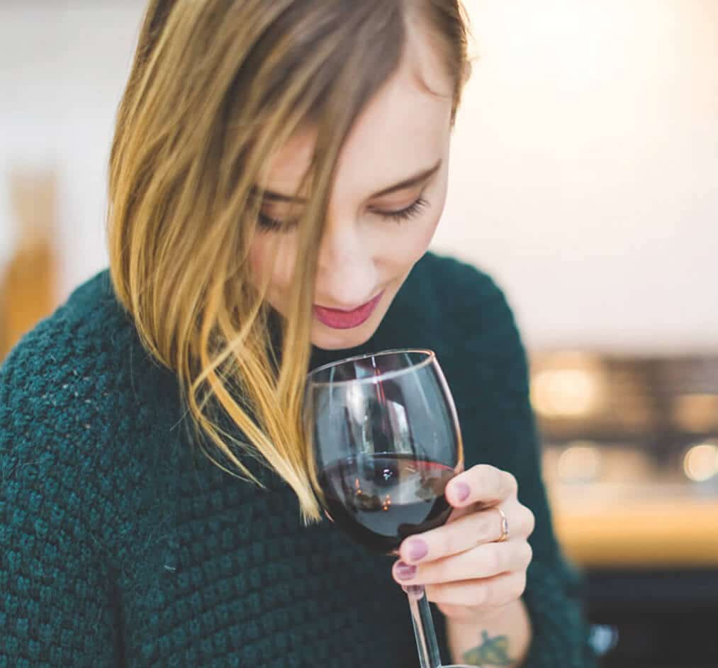 woman with a glass of wine