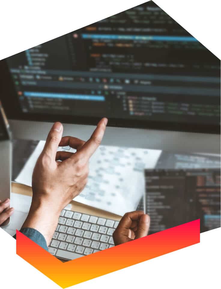 programmer reviewing code with project manager for custom application he is developing